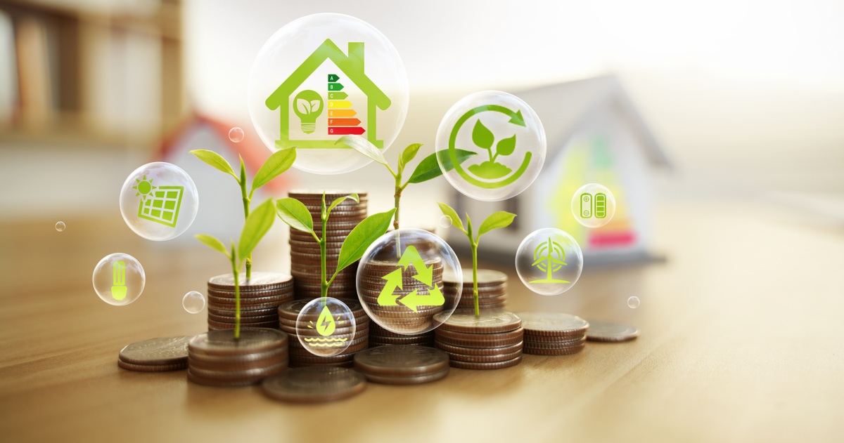 Stapels muntgeld met icoontjes erop van een plantje, windenergie, zonnepanelen